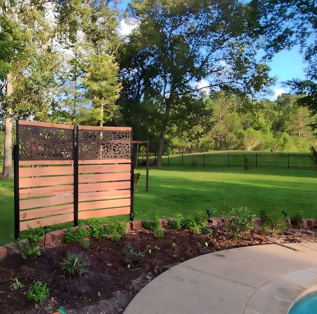 Decorative wooden privacy screen in garden