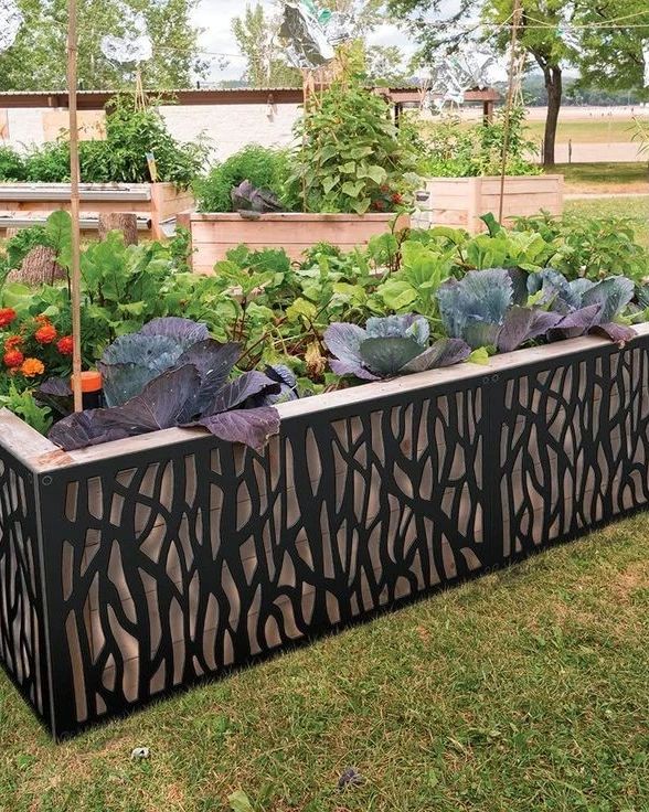 Decorative metal planter with colorful vegetables