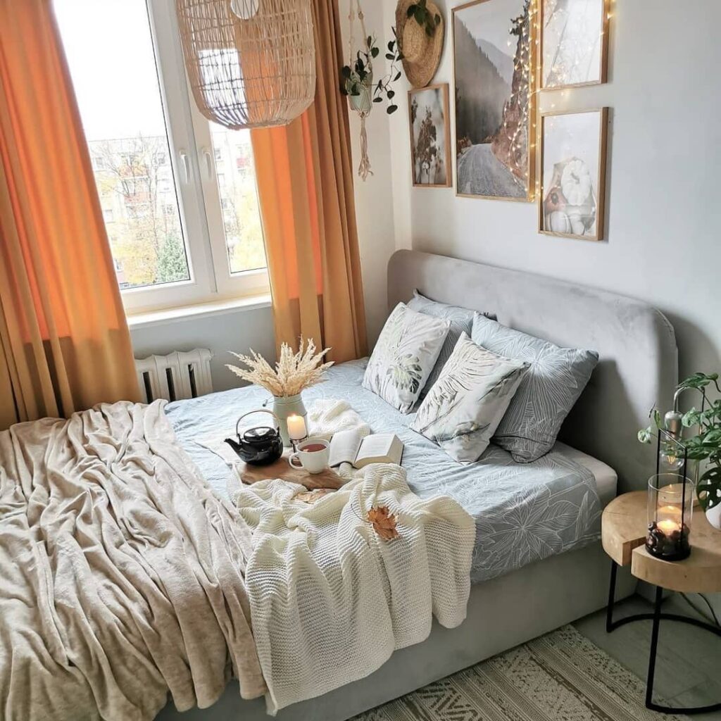 Cozy bedroom, orange curtains, nature decor