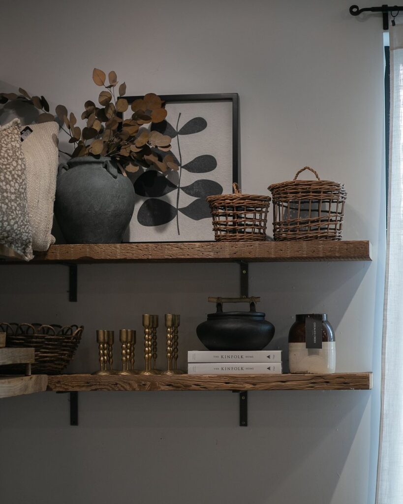 Wooden shelves with autumn-themed decor items