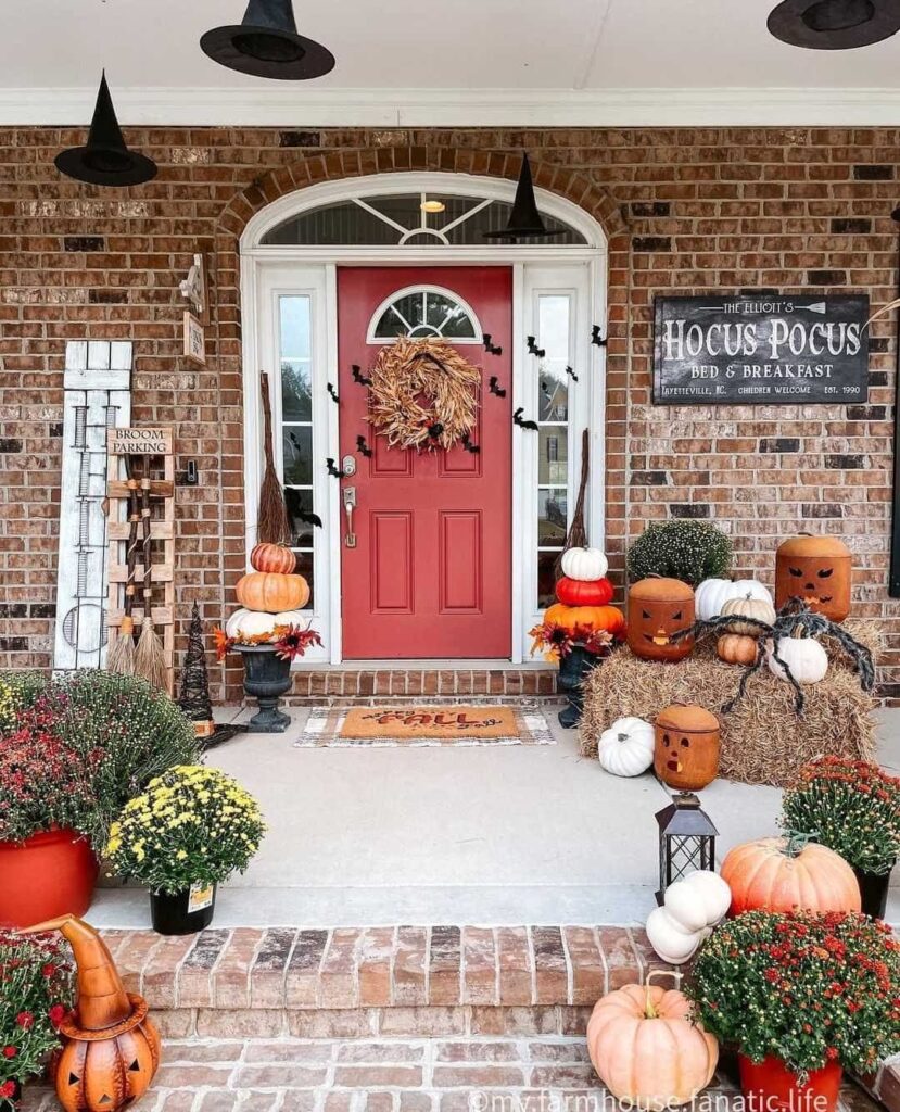 Halloween porch, pumpkins, mums, witch decor