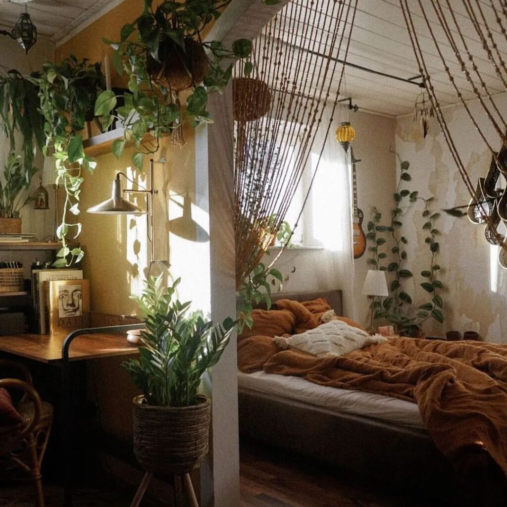 Boho bedroom overflowing with plants