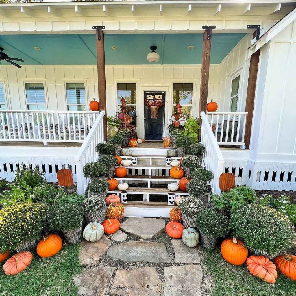 Farmhouse porch autumn decor pumpkins mums