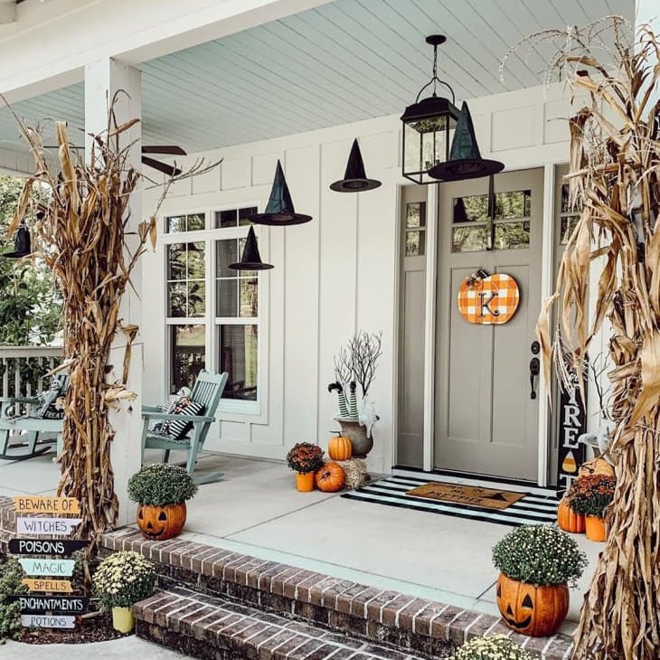 Halloween porch witches corn stalks pumpkins