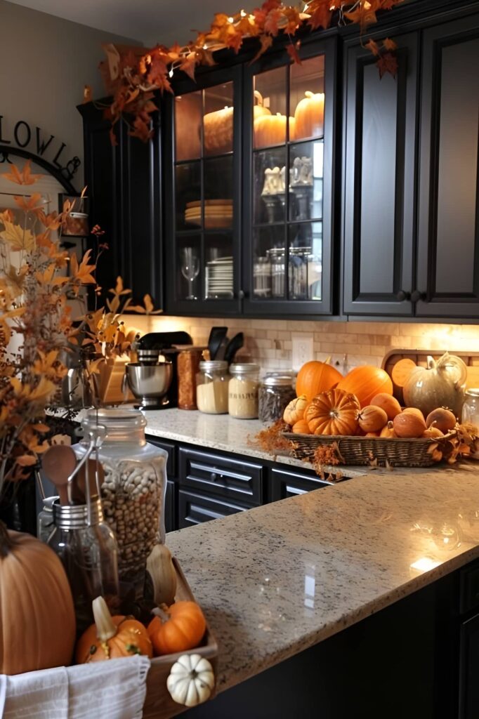 Fall kitchen decor, pumpkins, garland, black cabinets