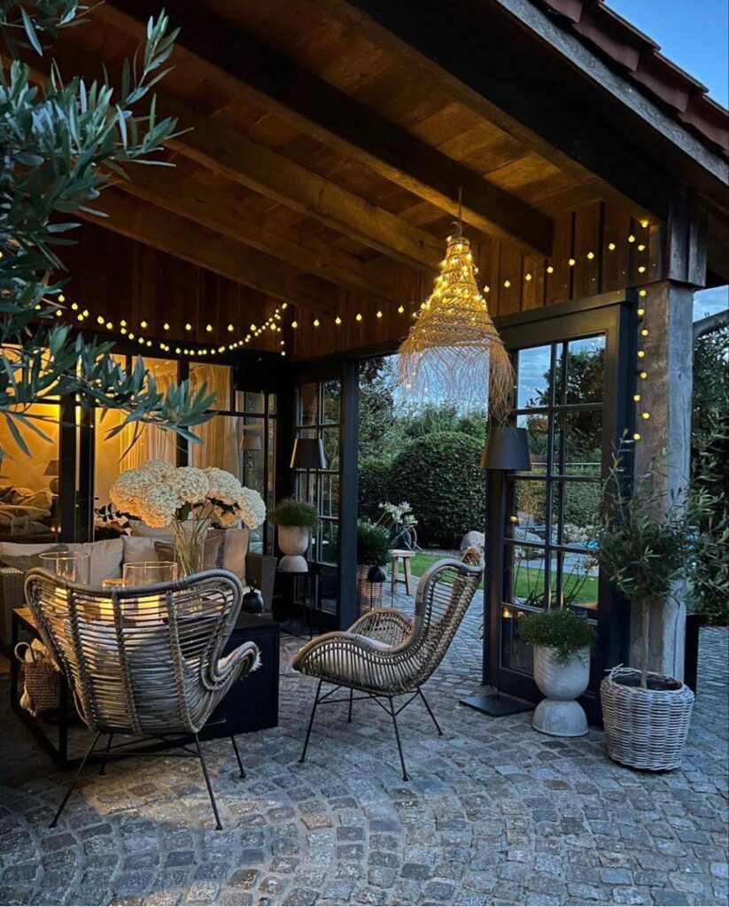 Illuminated patio with rattan furniture