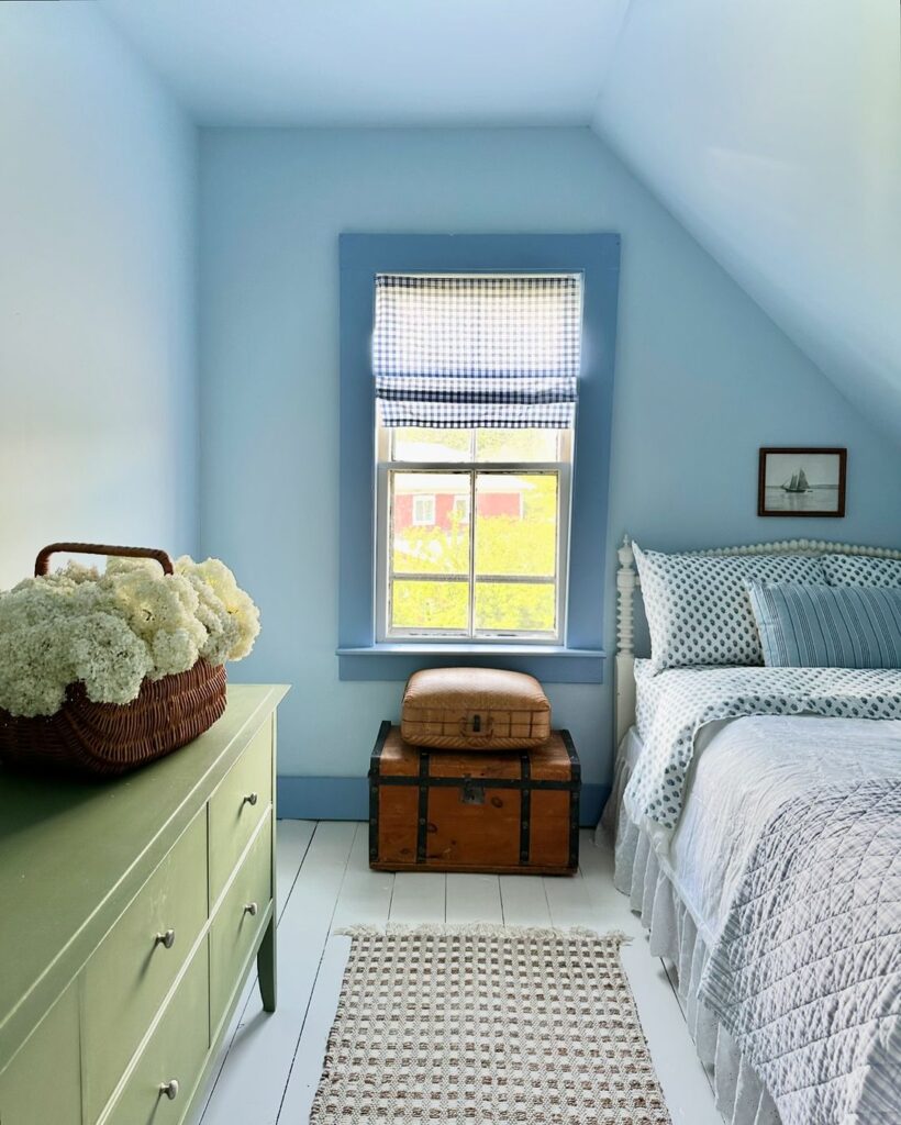 Blue attic bedroom with vintage accents