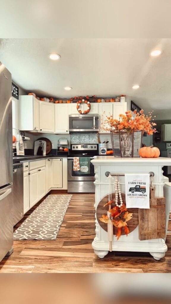 Neutral fall kitchen, pumpkins, white cabinets, farmhouse decor