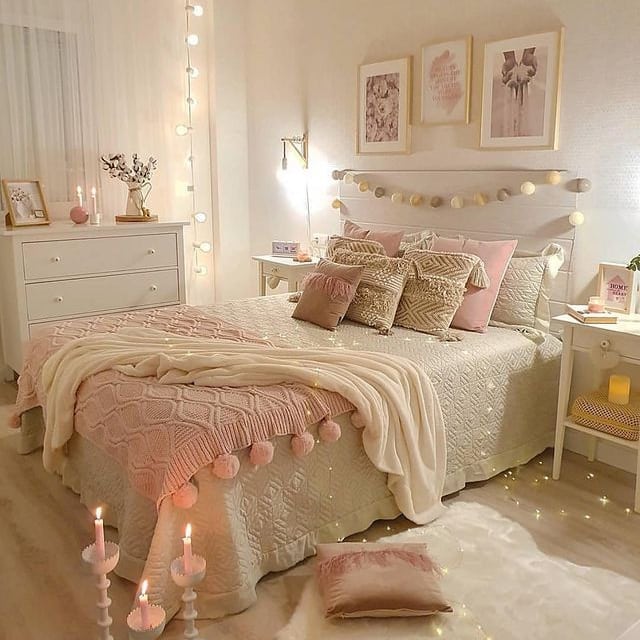 Feminine bedroom with pink accents, fairy lights