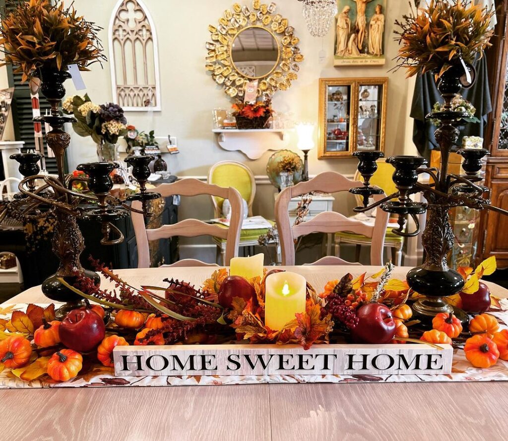 Fall table decor, candles, pumpkins, apples