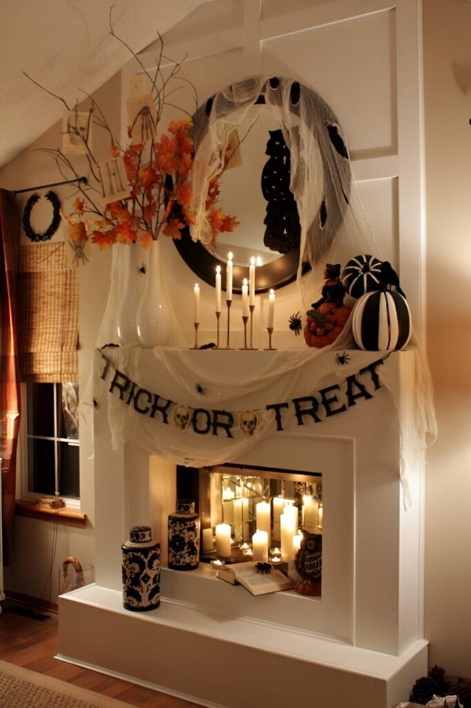 Halloween-decorated fireplace with candles and cobwebs