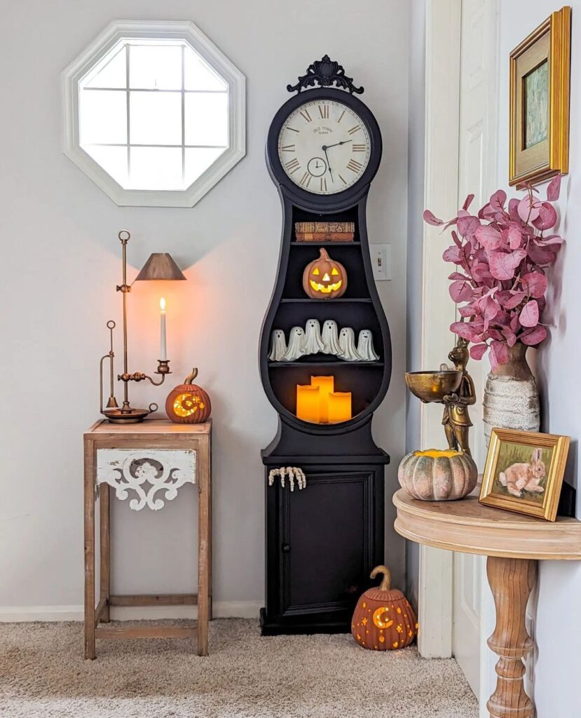 Halloween-decorated grandfather clock with pumpkins and ghosts