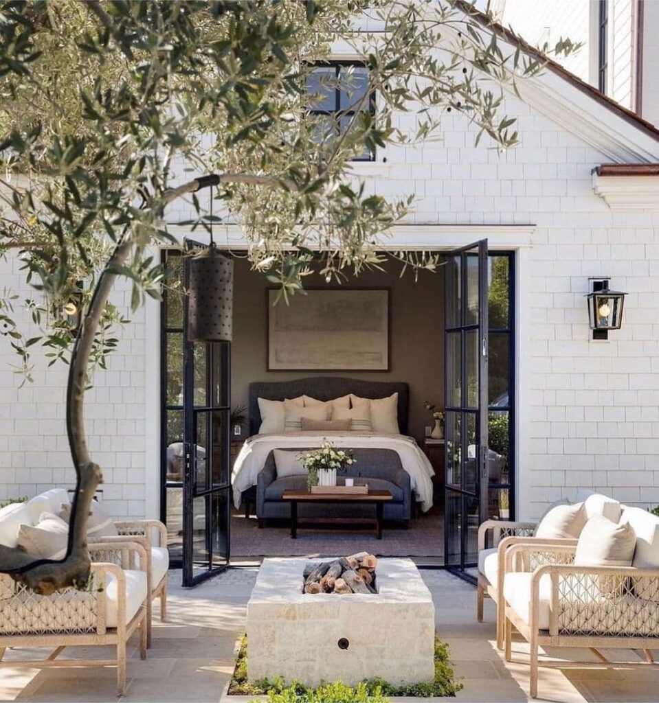 Bedroom open to patio, olive tree, fire pit