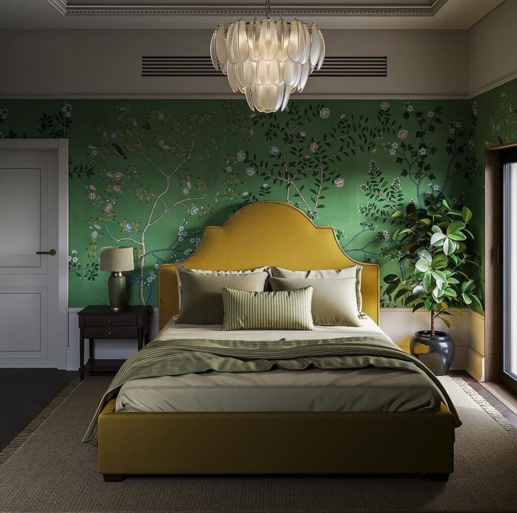 Green floral wallpaper, yellow bed, elegant chandelier