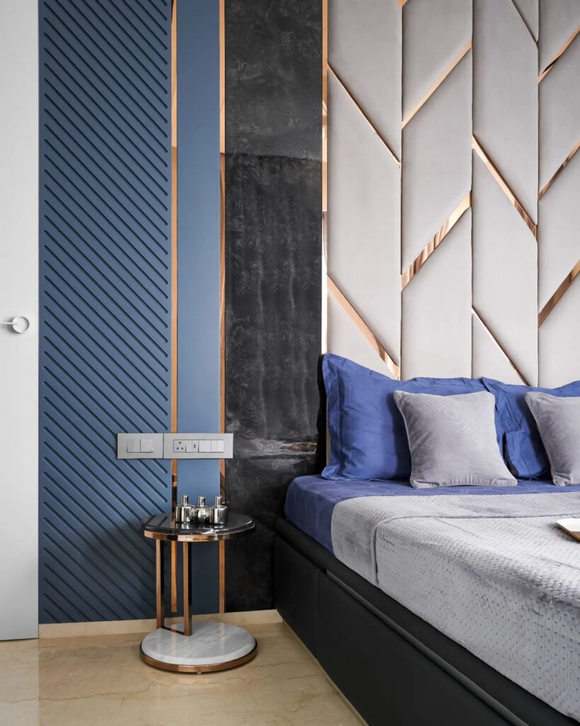 Blue geometric bedroom with textured walls