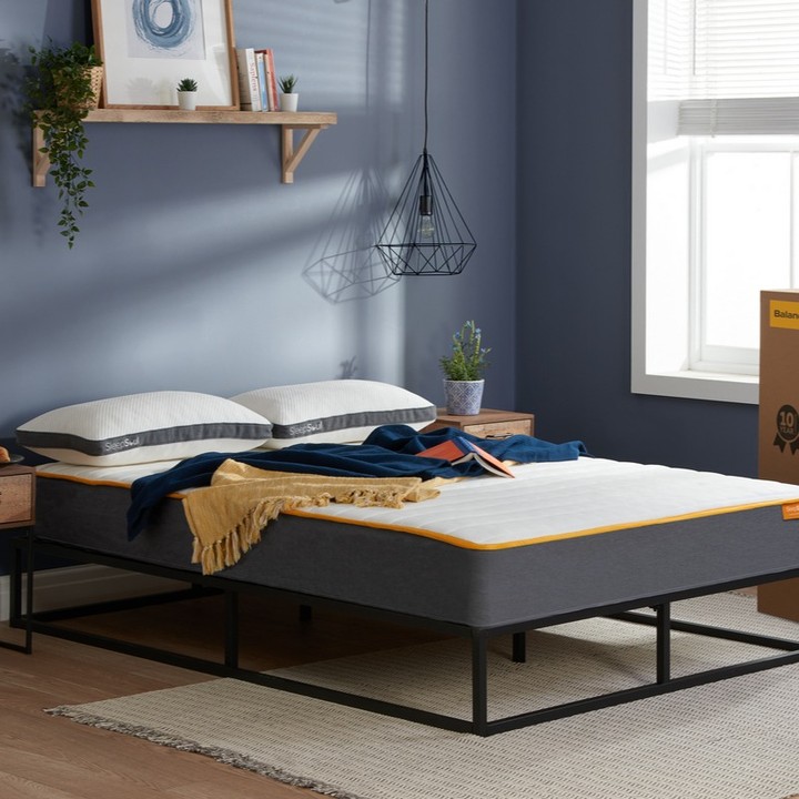 Blue-gray bedroom with modern platform bed