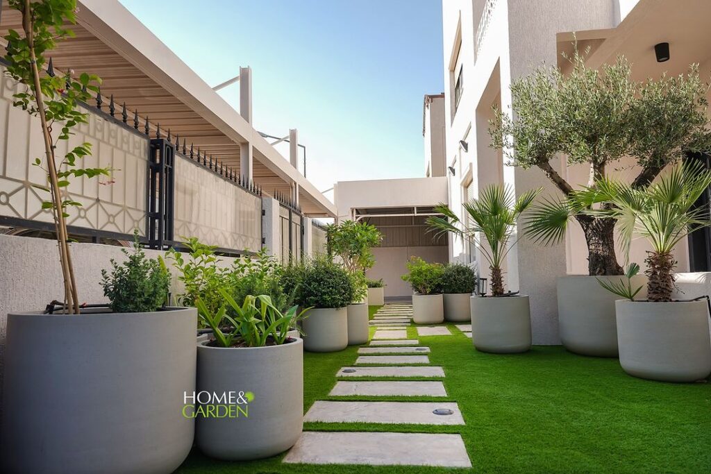 Urban courtyard with potted plants and pavers