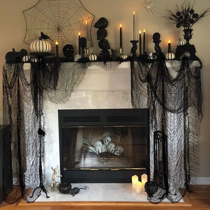 Halloween fireplace with black and white decor