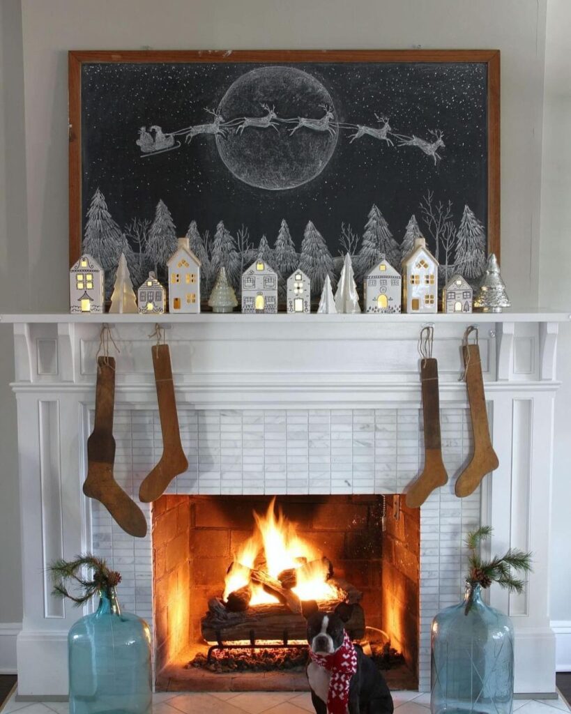 Chalkboard Christmas scene illuminated village fireplace