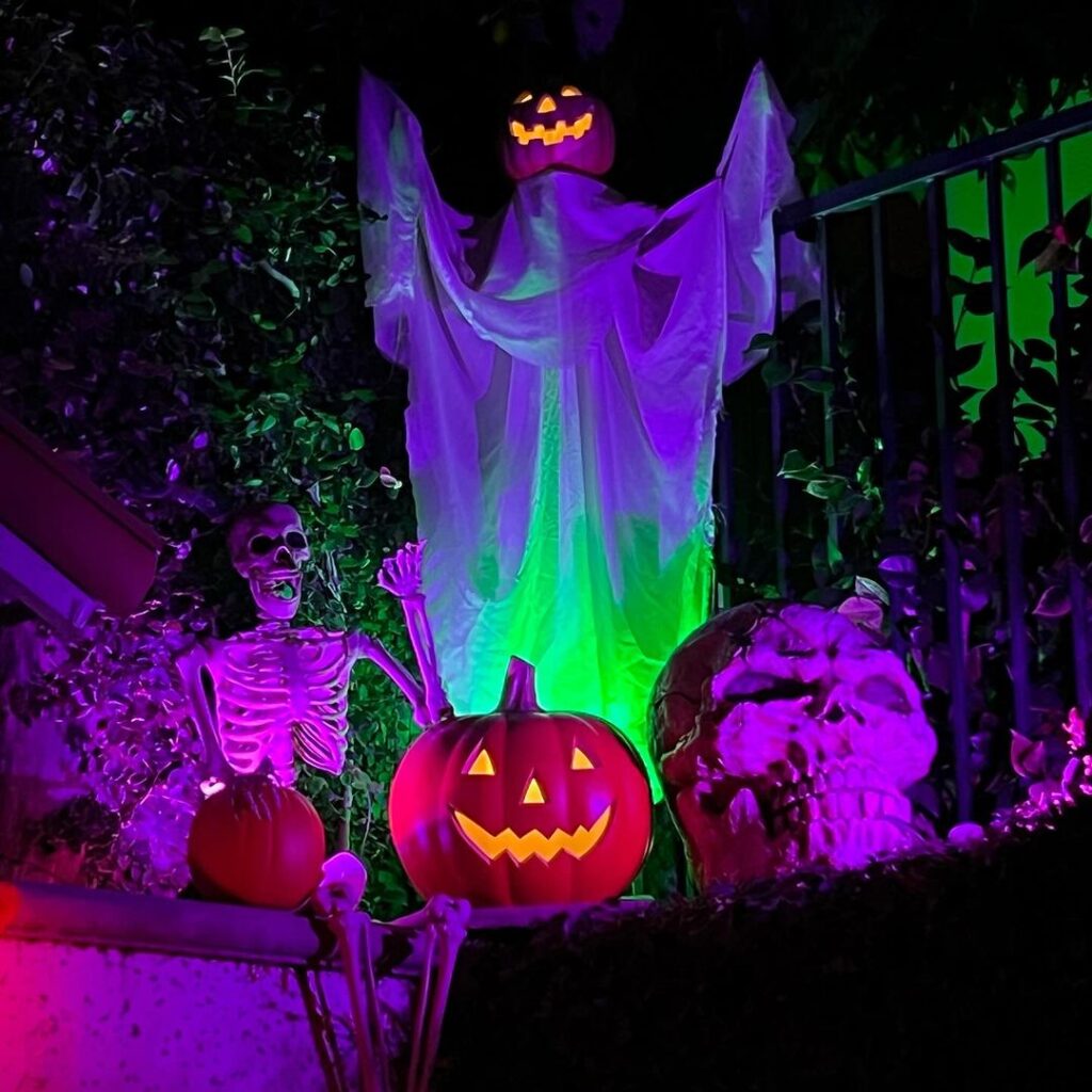 Glowing Halloween decorations with ghost and skeletons