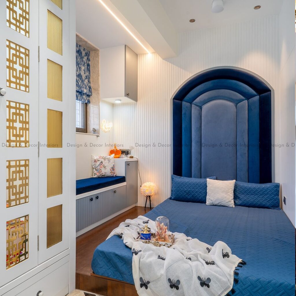 Blue velvet alcove, gold lattice panels, Moroccan-inspired