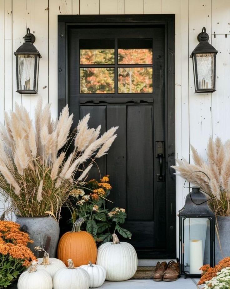 Fall porch with pumpkins, pampas grass