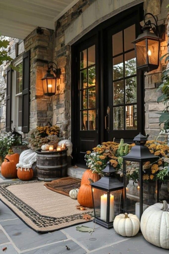 Stone porch with pumpkins and lanterns