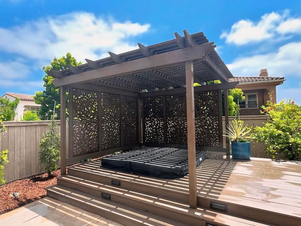 Private pergola daybed patterned privacy screens