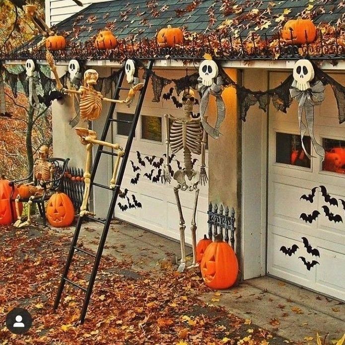 Skeleton decorations, garage, pumpkins, autumn leaves