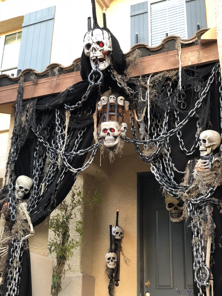 Spooky porch with skeletons and chains