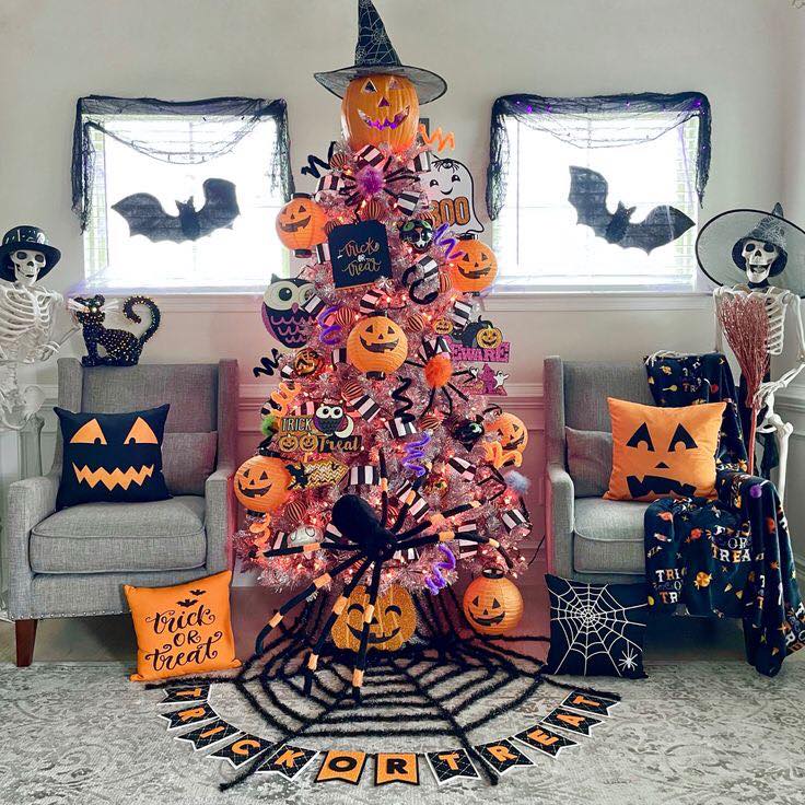 Pink Halloween tree with spooky decorations