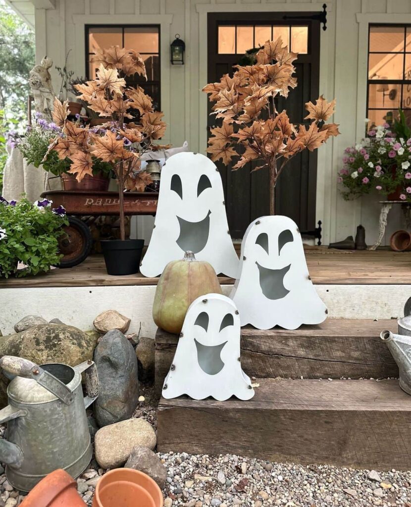 Ghost decorations, fall leaves, rustic porch