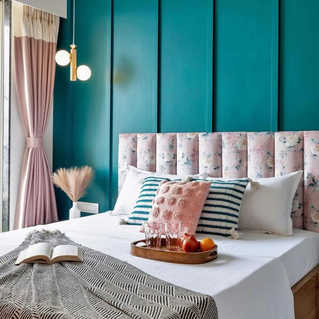 Teal walls, pink floral headboard, modern chic