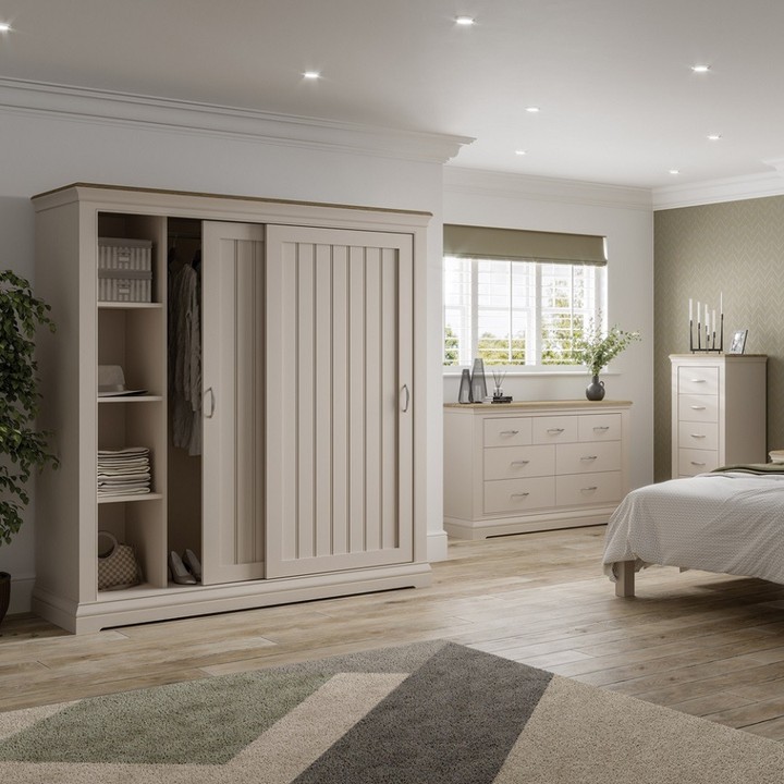 Beige bedroom with built-in wardrobe storage