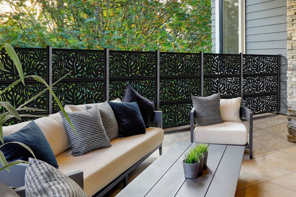 Modern patio with decorative black privacy screens