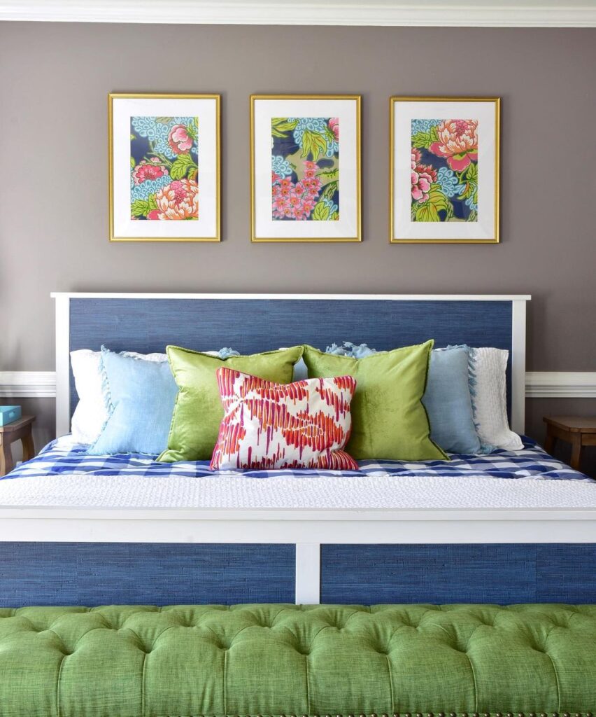 Colorful bedroom with floral artwork, blue-green accents