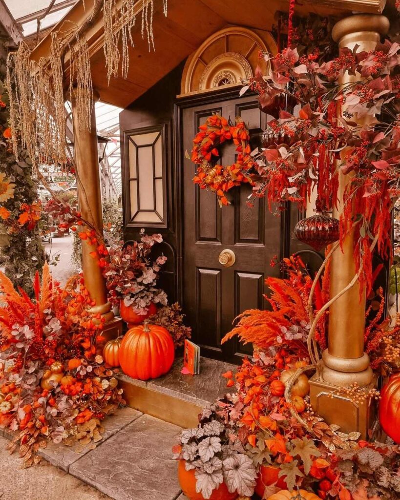 Luxurious autumn display framing ornate door.