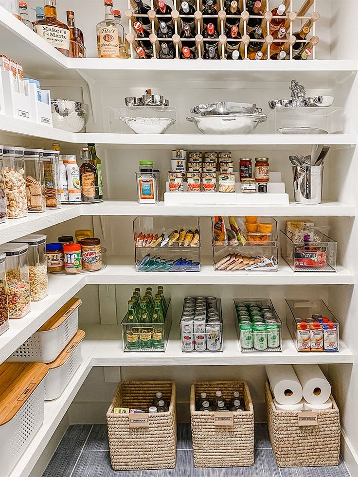 Organized pantry with beverage racks and clear containers