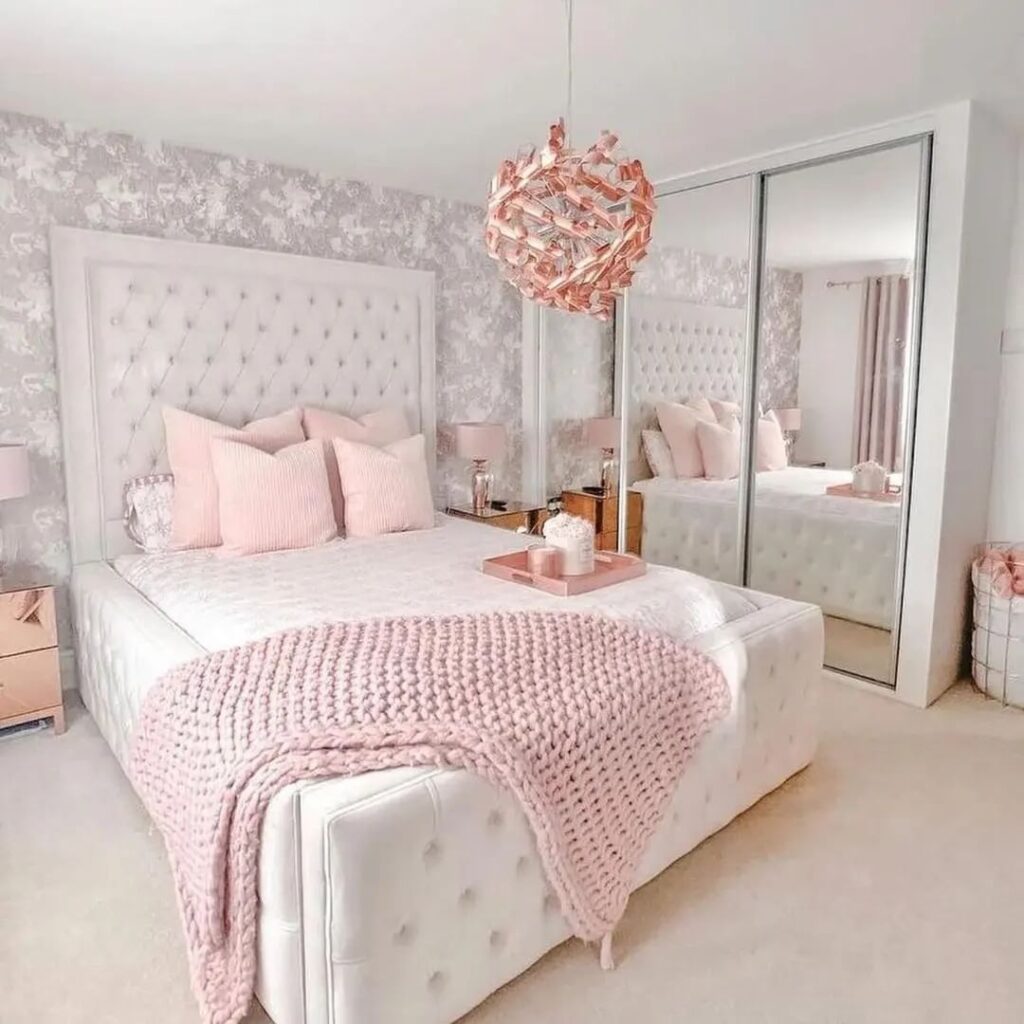  Luxurious pink and white bedroom with tufted bed