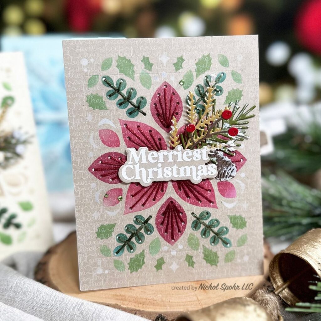 Handmade Christmas card with paper poinsettia and greenery