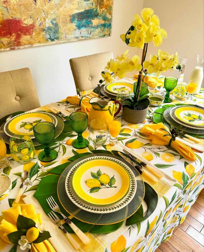 Lemon-themed Thanksgiving table with yellow orchid centerpiece