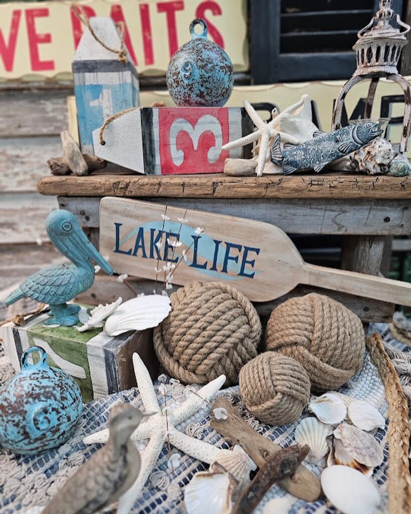 Rustic lake-themed decor collection on wood