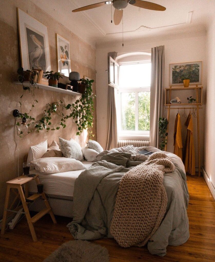  Cozy bedroom with plants hanging over bed