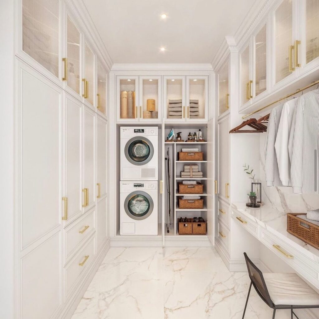 Upscale laundry room with built-in closet storage.