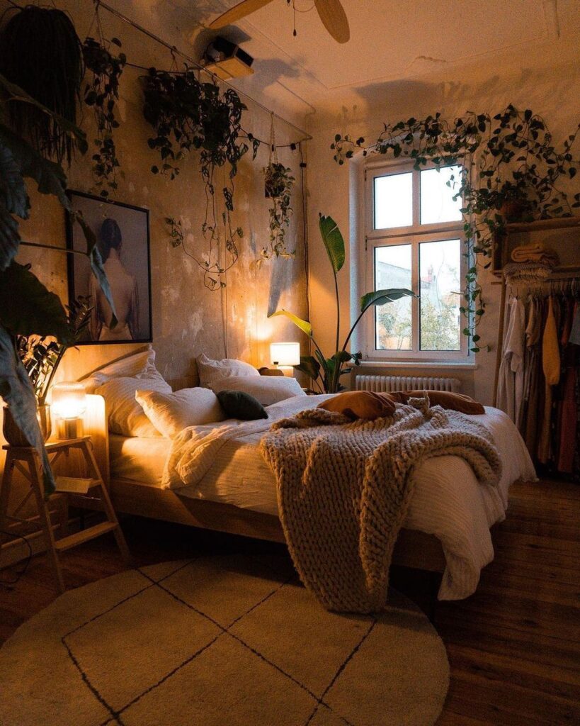 Cozy bedroom with hanging plants and warm lighting