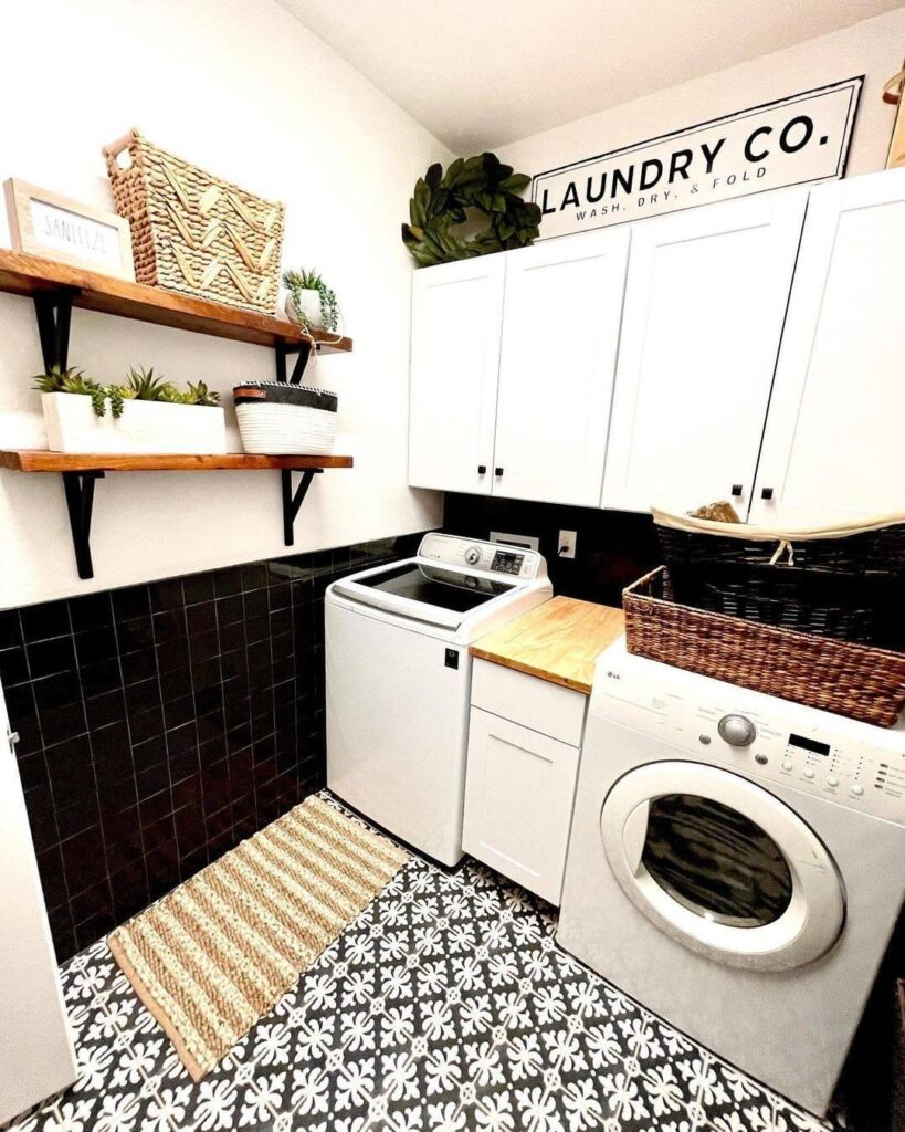 Chic laundry room with patterned floor top-load washer and rustic decor.