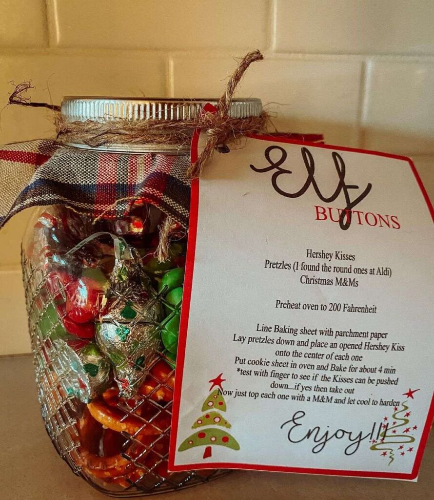 Jar filled with candies and recipe card for Elf Buttons treats