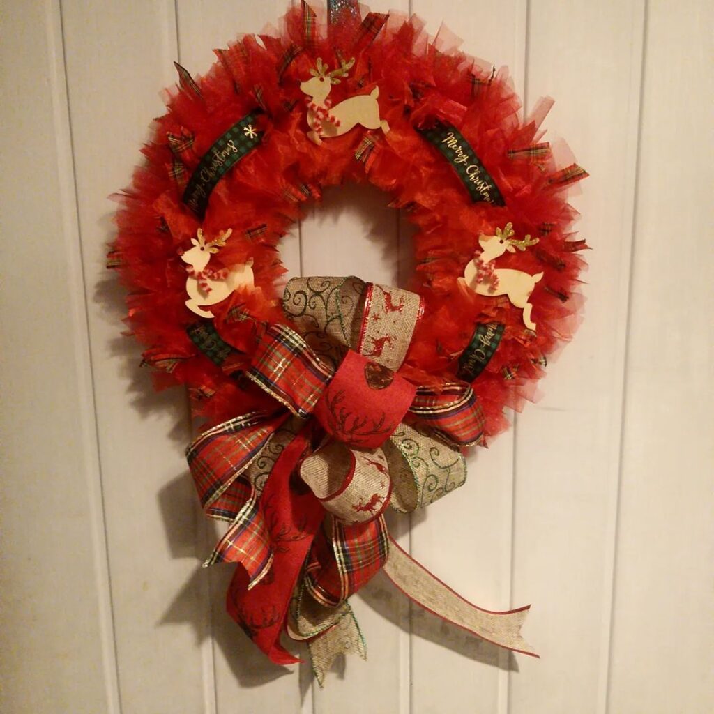 Red tulle wreath with reindeer decorations