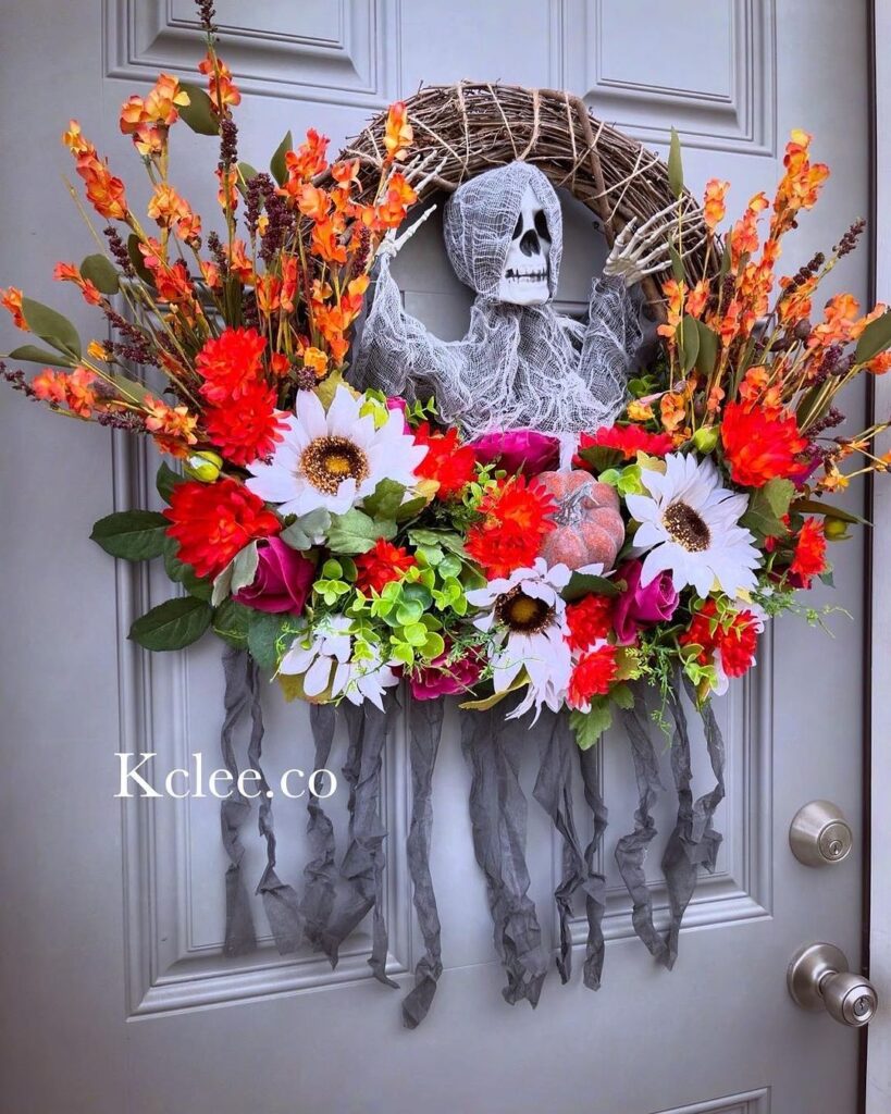 Spooky Halloween wreath featuring skeleton and bright floral arrangement