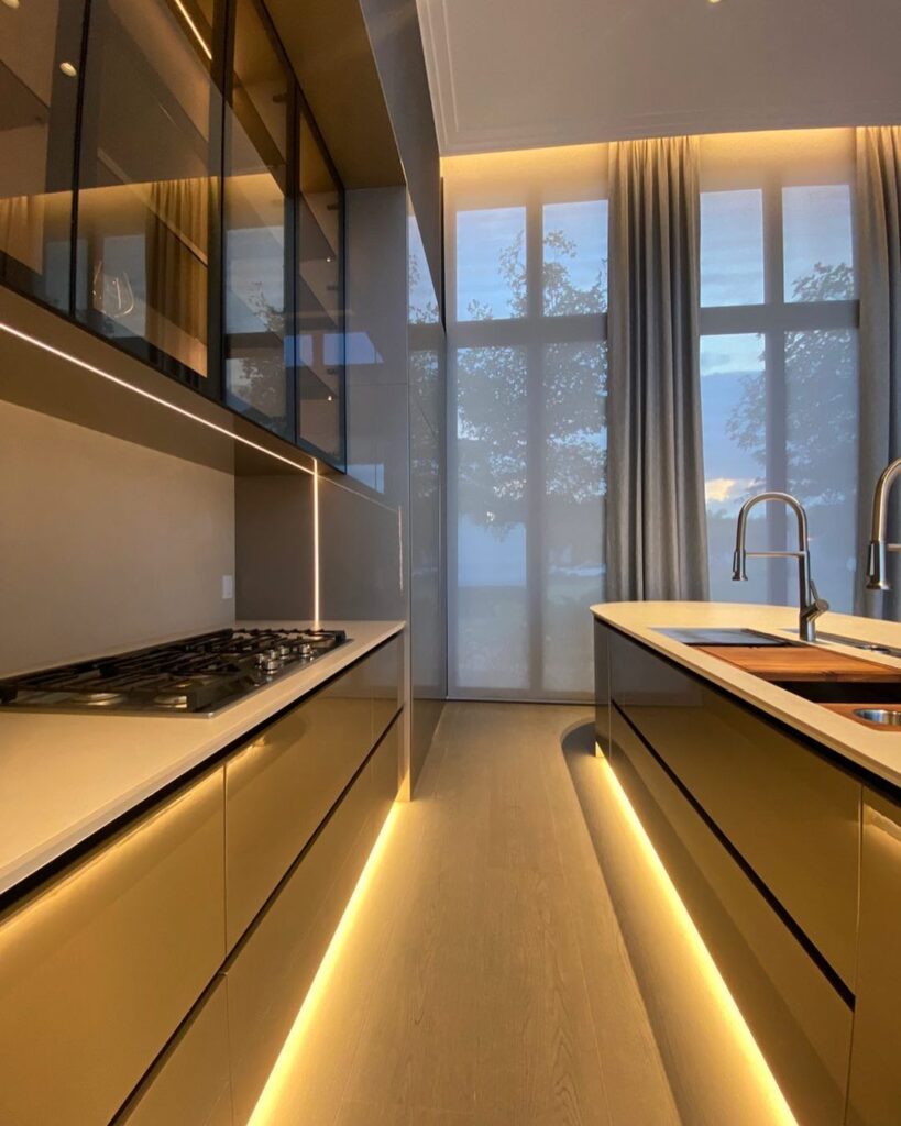 Modern kitchen with parallel islands and illuminated floors